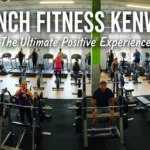 Bright interior of Crunch Fitness Kenwood gym showing cardio machines, weight training equipment, and members exercising – Crunch Fitness Kenwood